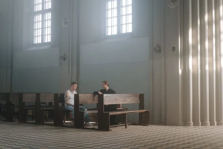 guy sitting in church talking to a pastor - my story of overcoming porn