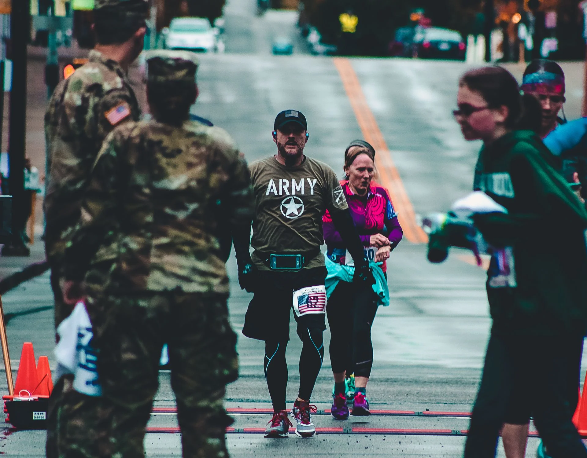 Army veteran finishing a race — the ambition of shame drives high-achieving men toward both success and secret porn addiction